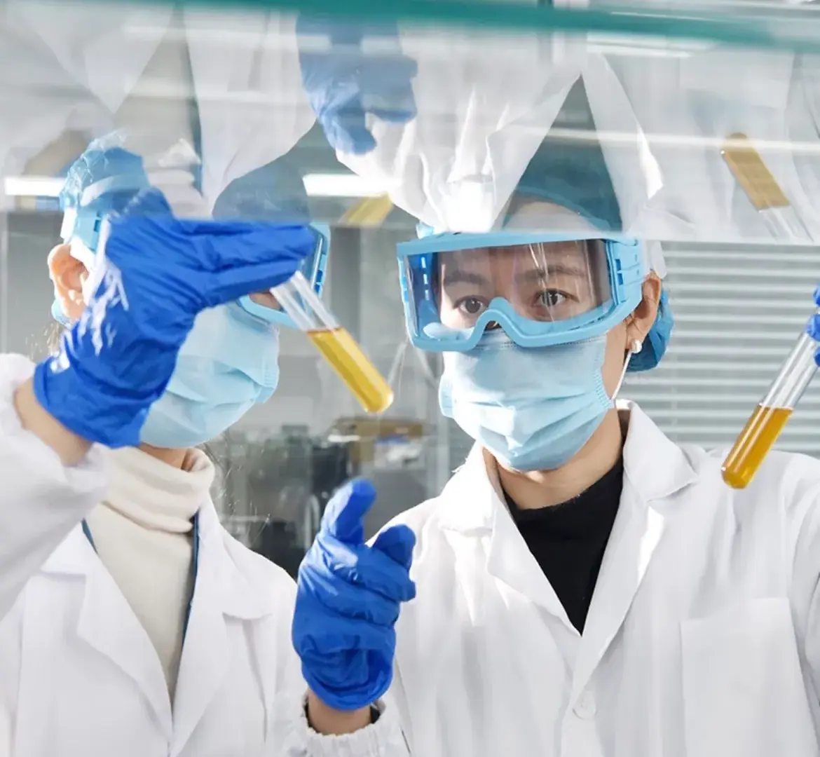 Laboratory specialists reviewing samples