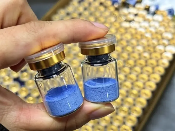 Two glass vials shown against an organized product tray